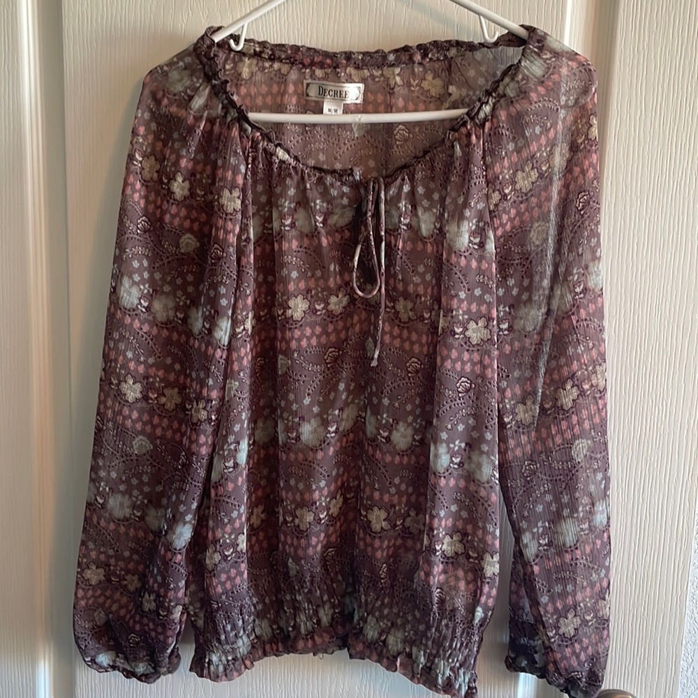 Women’s size medium blouse. Purple colors. Great condition